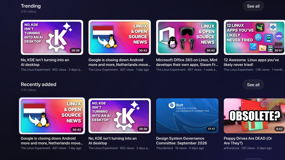 The home screen: shelves of trending and recently added videos.